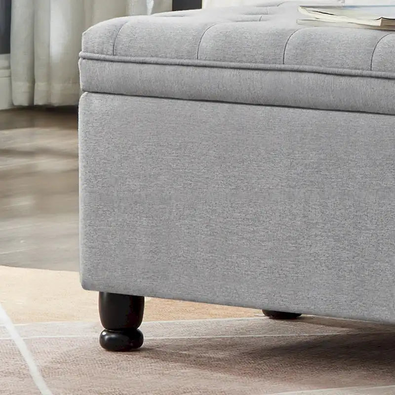 Panca contenitore trapuntata con gambe in legno