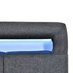 Letto a piattaforma imbottito singolo con luci a LED e cassetti portaoggetti