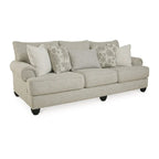 Divano in tessuto beige con braccioli arrotolati – 98L x 44P x 40A