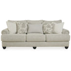 Divano in tessuto beige con braccioli arrotolati – 98L x 44P x 40A